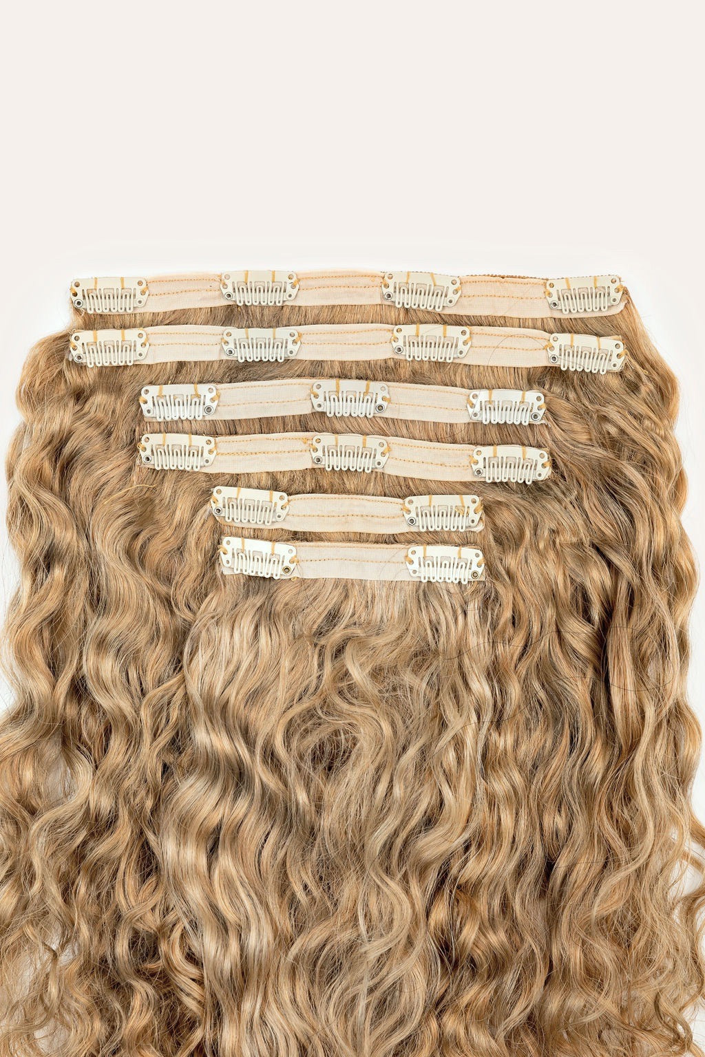 Curly hair extensions outlet blonde